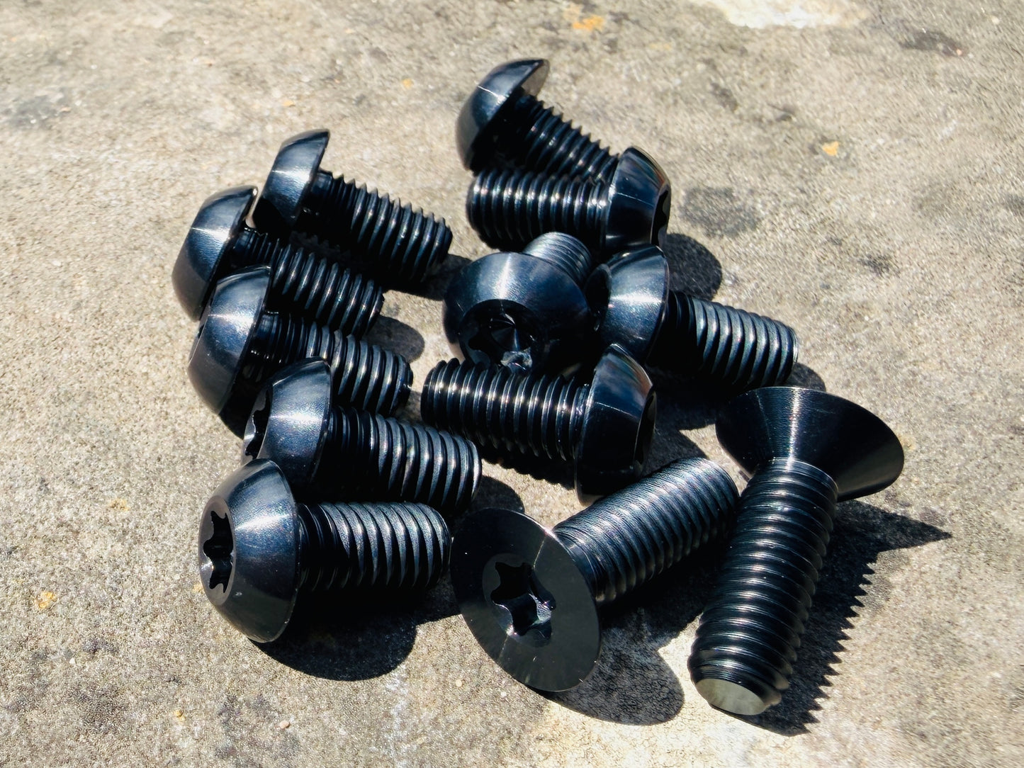 black titanium disc bolt kit for Specialized Levo and Kenevo models that feature a rear wheel speed sensor magnet