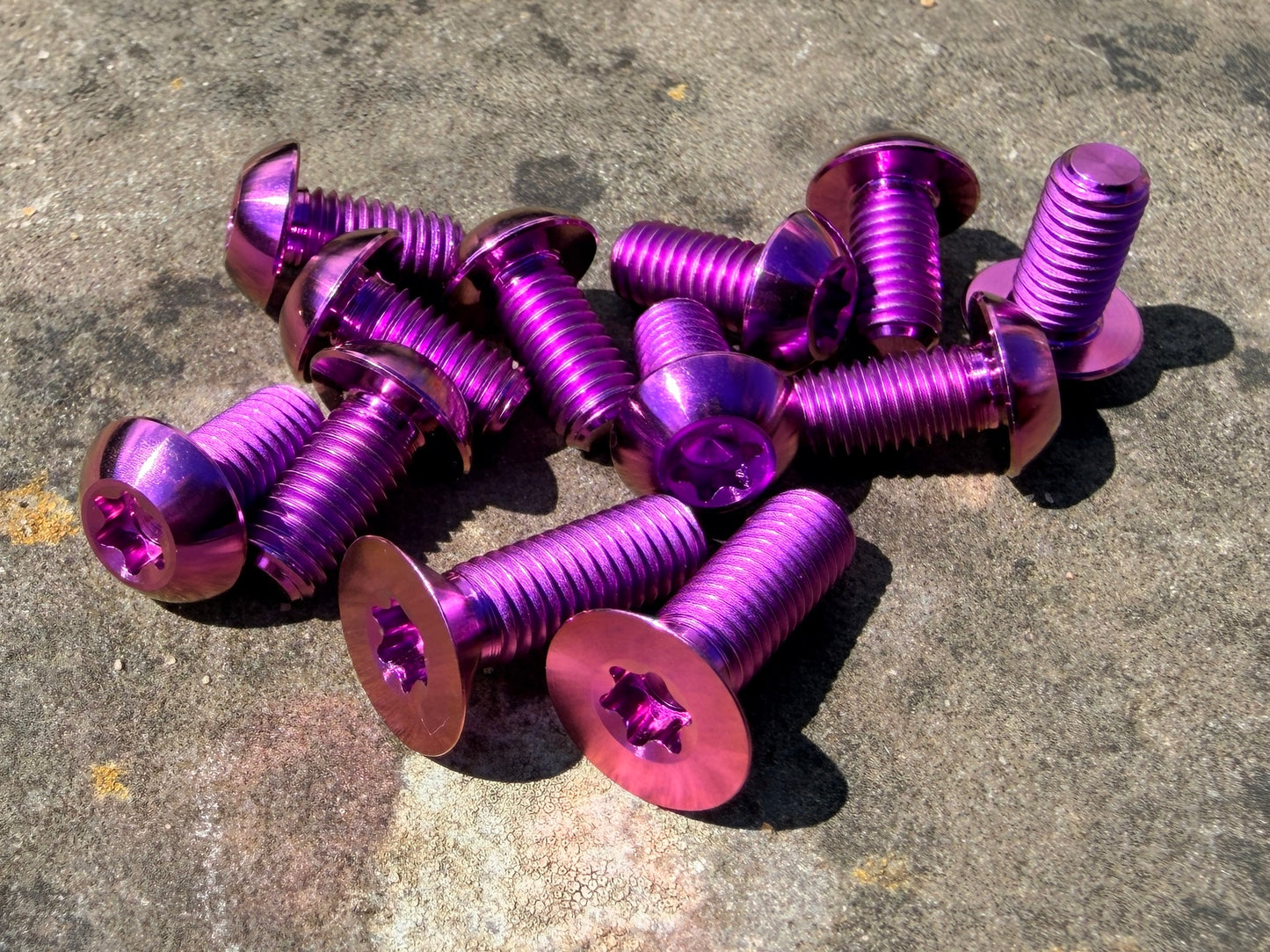 purple titanium disc bolt kit for Specialized Levo and Kenevo models that feature a rear wheel speed sensor magnet
