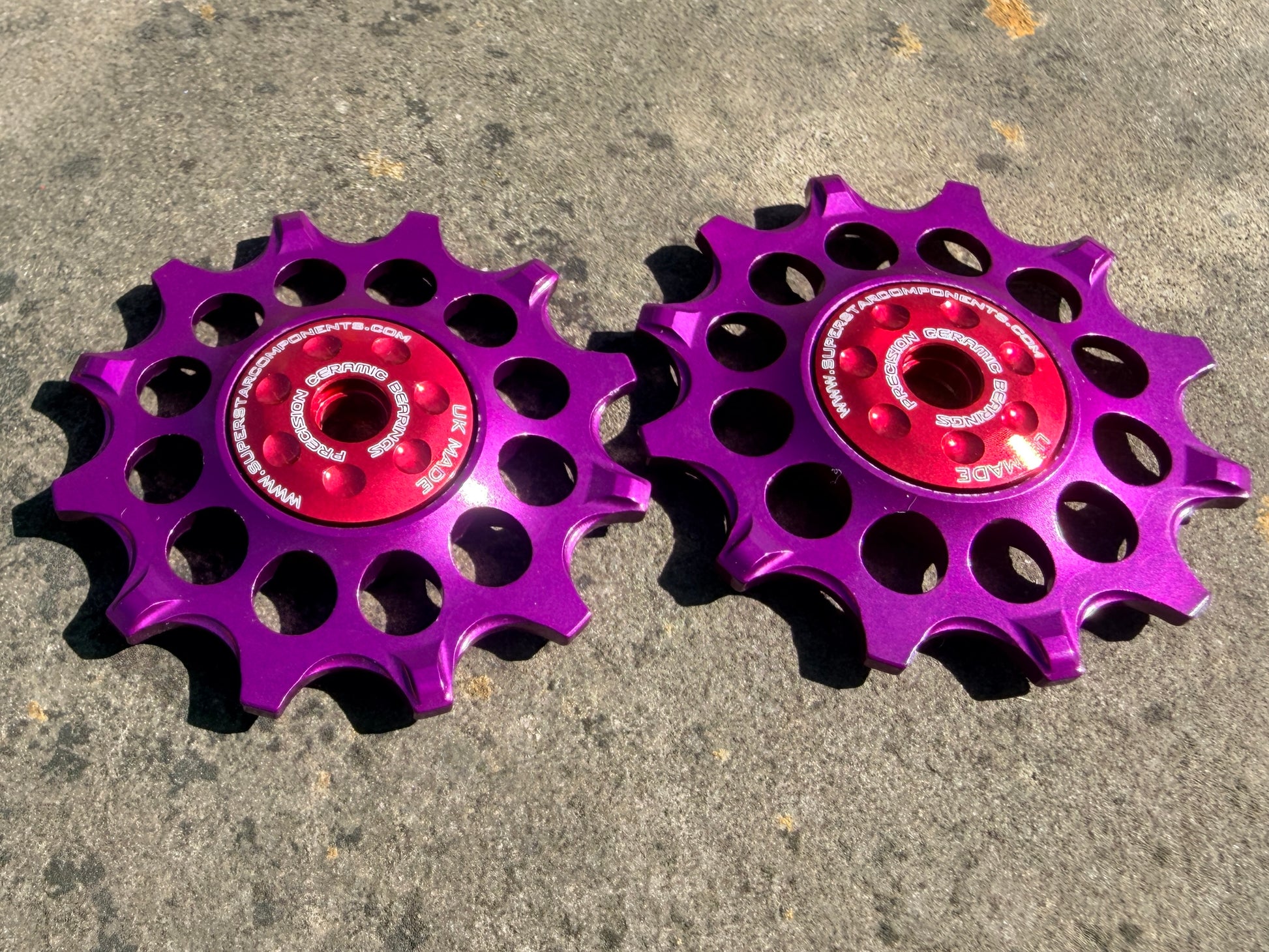 purple 12T jockey wheels with sealed ceramic bearings, designed for use with SRAM rear derailleurs.