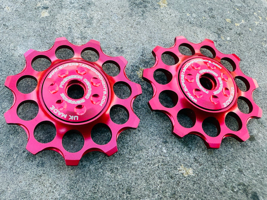 red 11T jockey wheels with sealed ceramic bearings, designed for use with SRAM rear derailleurs.