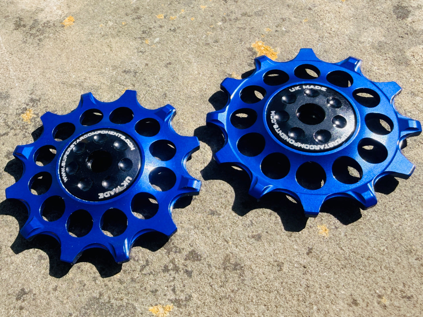 blue 12T jockey wheels with sealed bearings, designed for use with SRAM rear derailleurs.