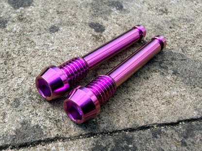 purple SRAM brake pad retention pins in CNC machined titanium