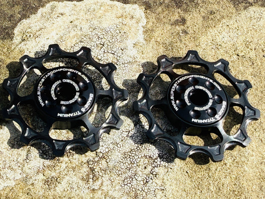 black 11T Titanium jockey wheels with sealed bearings, designed for use with SRAM rear derailleurs.
