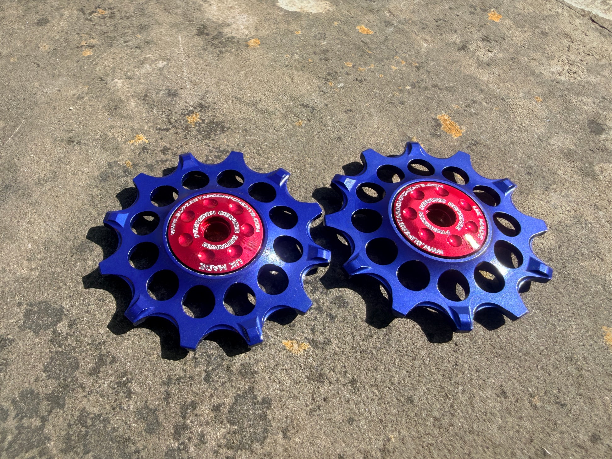 blue 12T jockey wheels with sealed ceramic bearings, designed for use with SRAM rear derailleurs.