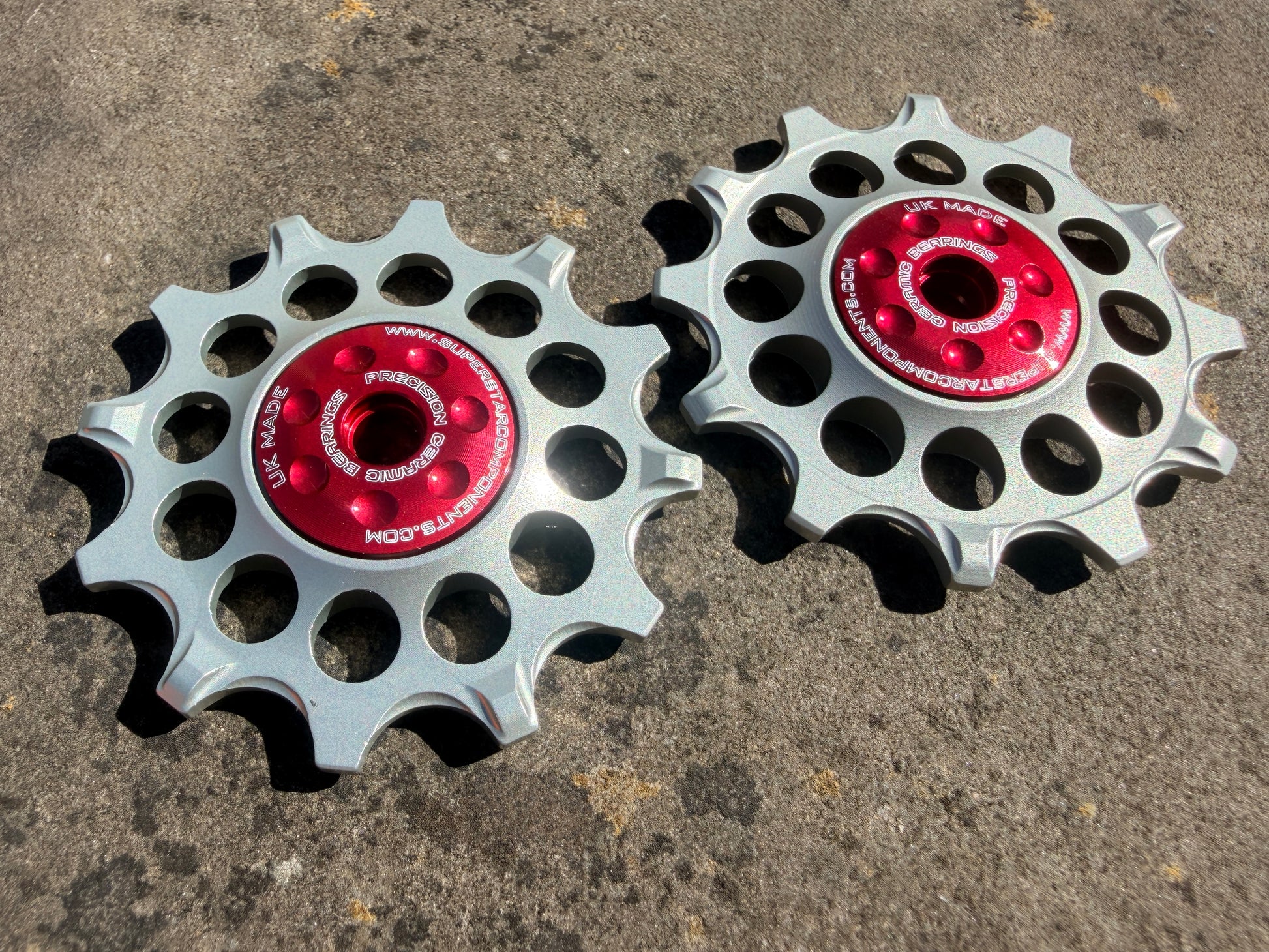 silver 12T jockey wheels with sealed ceramic bearings, designed for use with SRAM rear derailleurs.