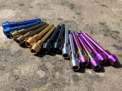 colourful Hope brake pad retention pins in CNC machined titanium