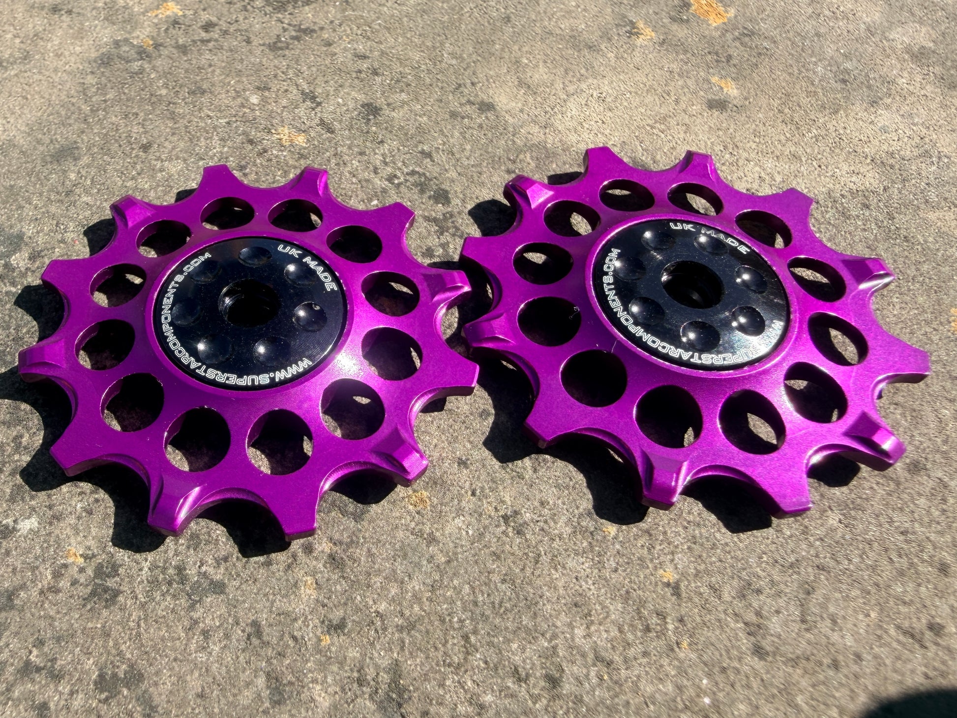 purple 12T jockey wheels with sealed bearings, designed for use with SRAM rear derailleurs.